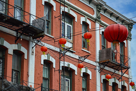 Linda McShane-Chinatown Lanterns and Brick Building